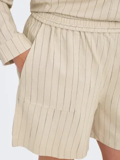 CARMONICA Medelhög midja Lös passform Chinoshorts