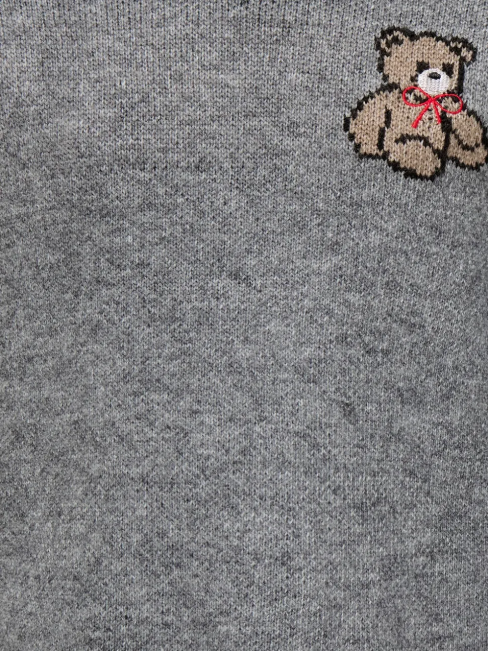KOGTEDDY Stickad tröja